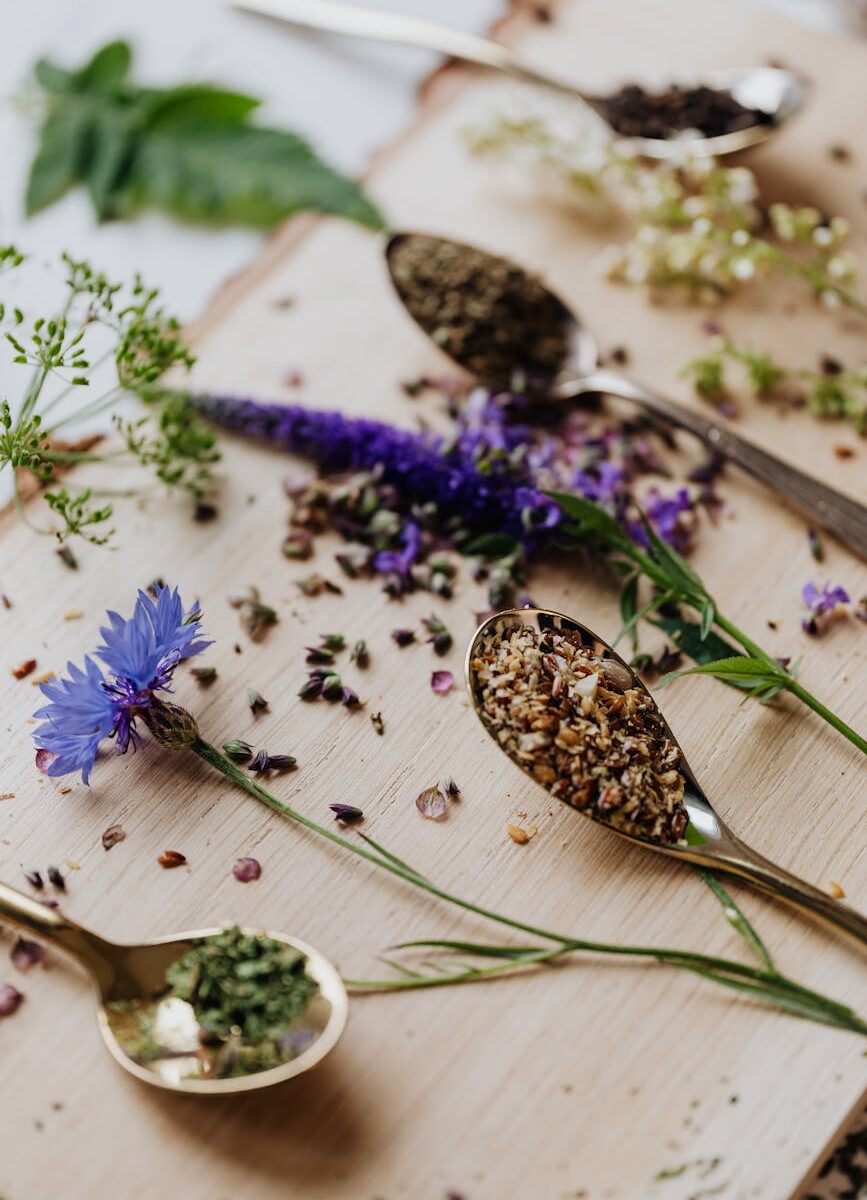 spices and herbs on wooden board